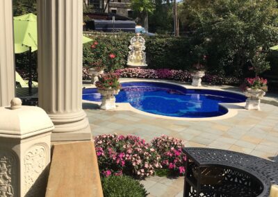 A pool in a backyard.